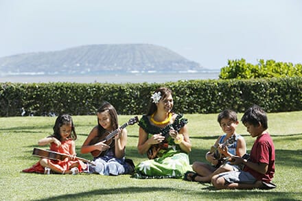 Kahalaha Resort kids playing ukulele