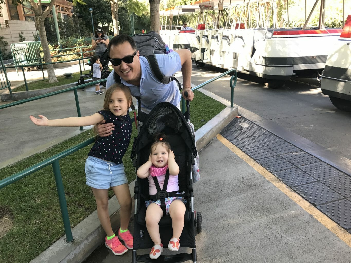 Our family waiting for the tram to take us in to Disney's Anaheim Resort.