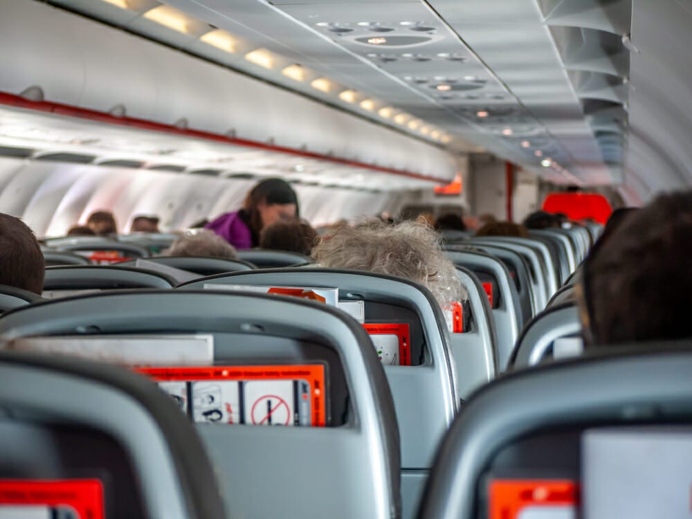 Passengers seated inside a Jetstar plane