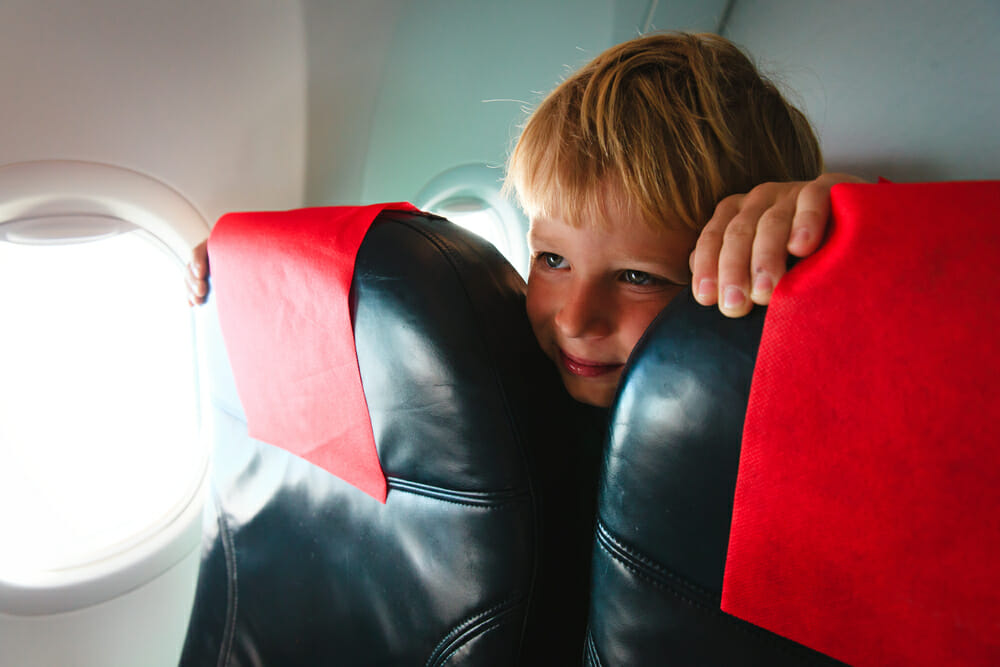  flying with kids plane Credit: Shutterstock