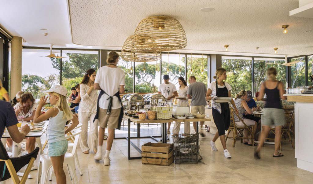 Guests enjoying food and drink at Bannisters Pavilion, Mollymook Beach on the South Coast.