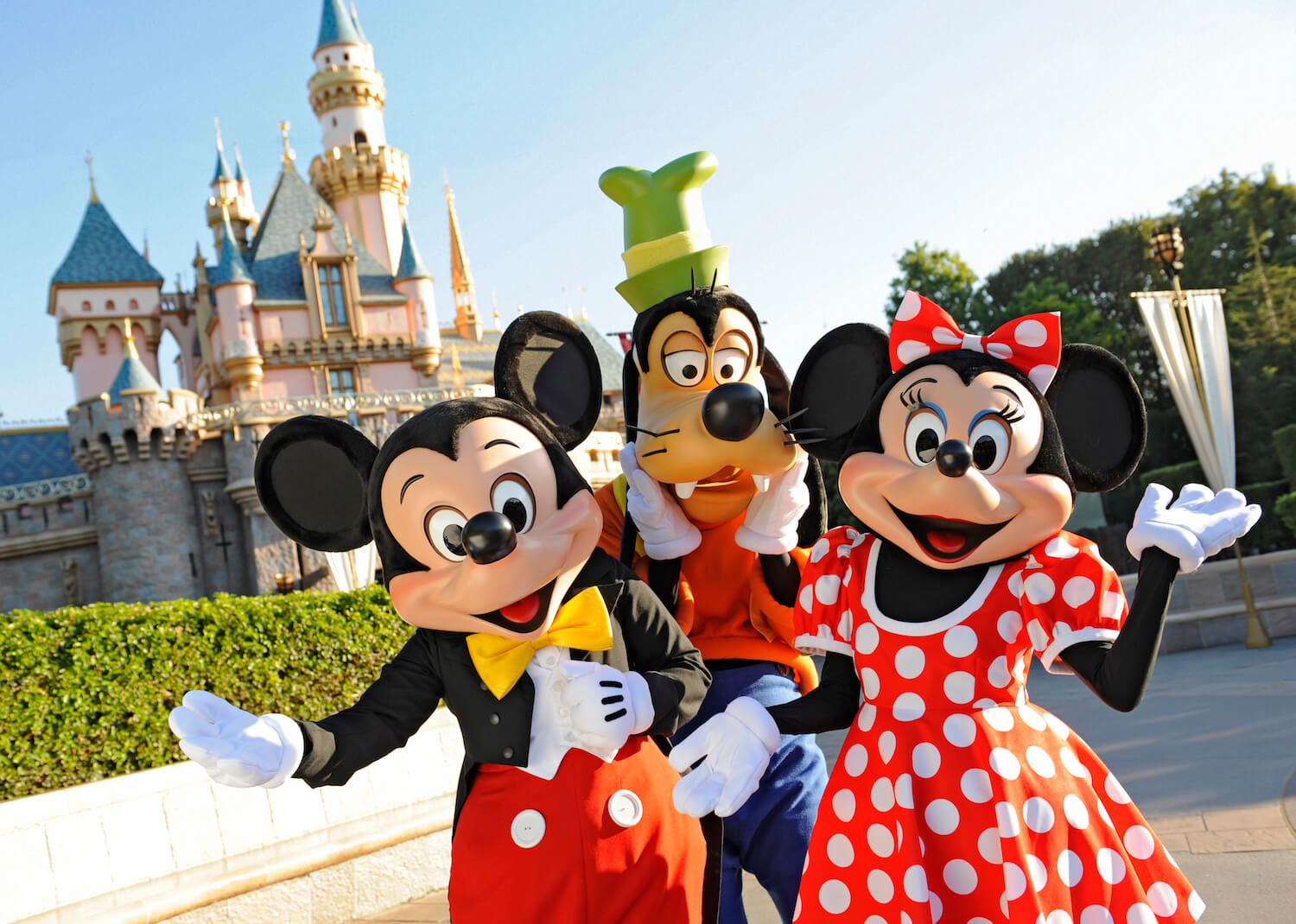 Mickey, Minnie and Goofy outside Disneyland California