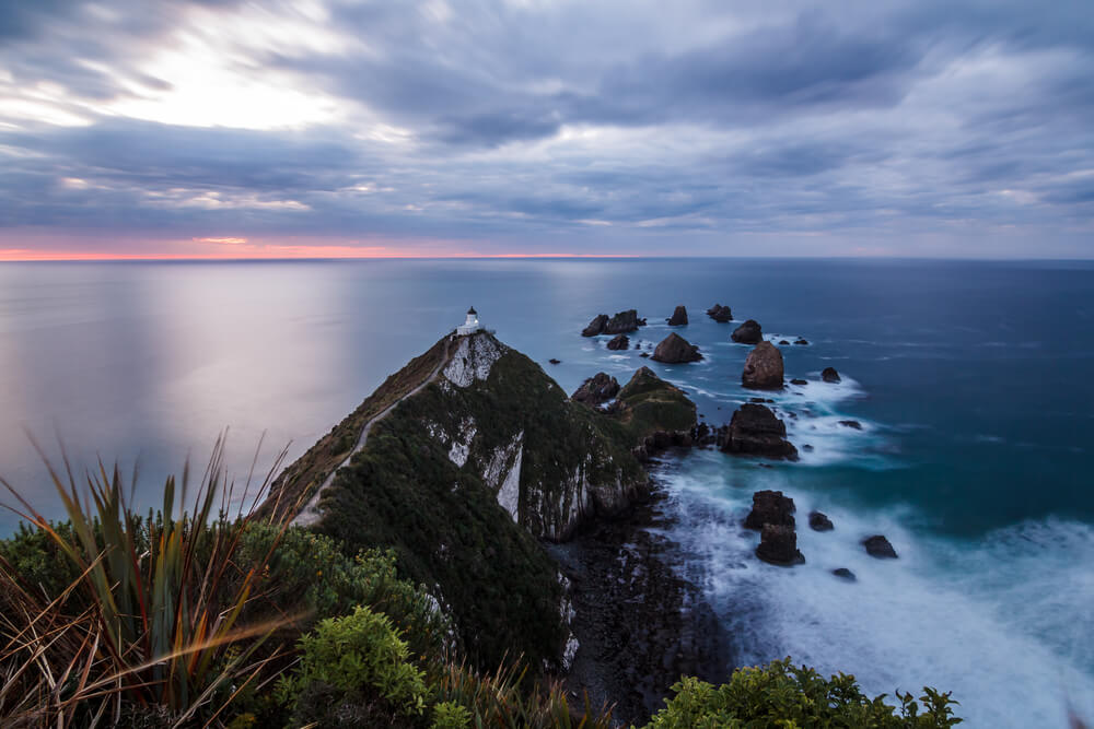 Scenery shot of sunrise at Nugget Point lighthouse