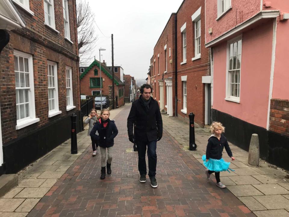 Michael Wayne in England with his partner's three girls.
