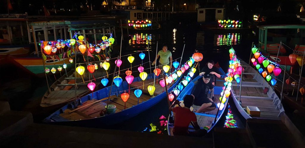 Boats decorated with lanterns in Hoi An Vietnam