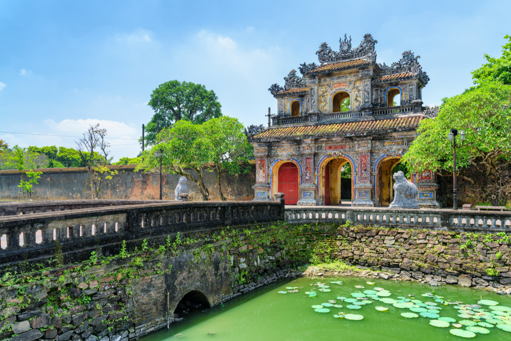 East Gate (Hien Nhon Gate) to the Citadel and a moat surrounding the Imperial City with the Purple Forbidden City in Hue, Vietnam.
