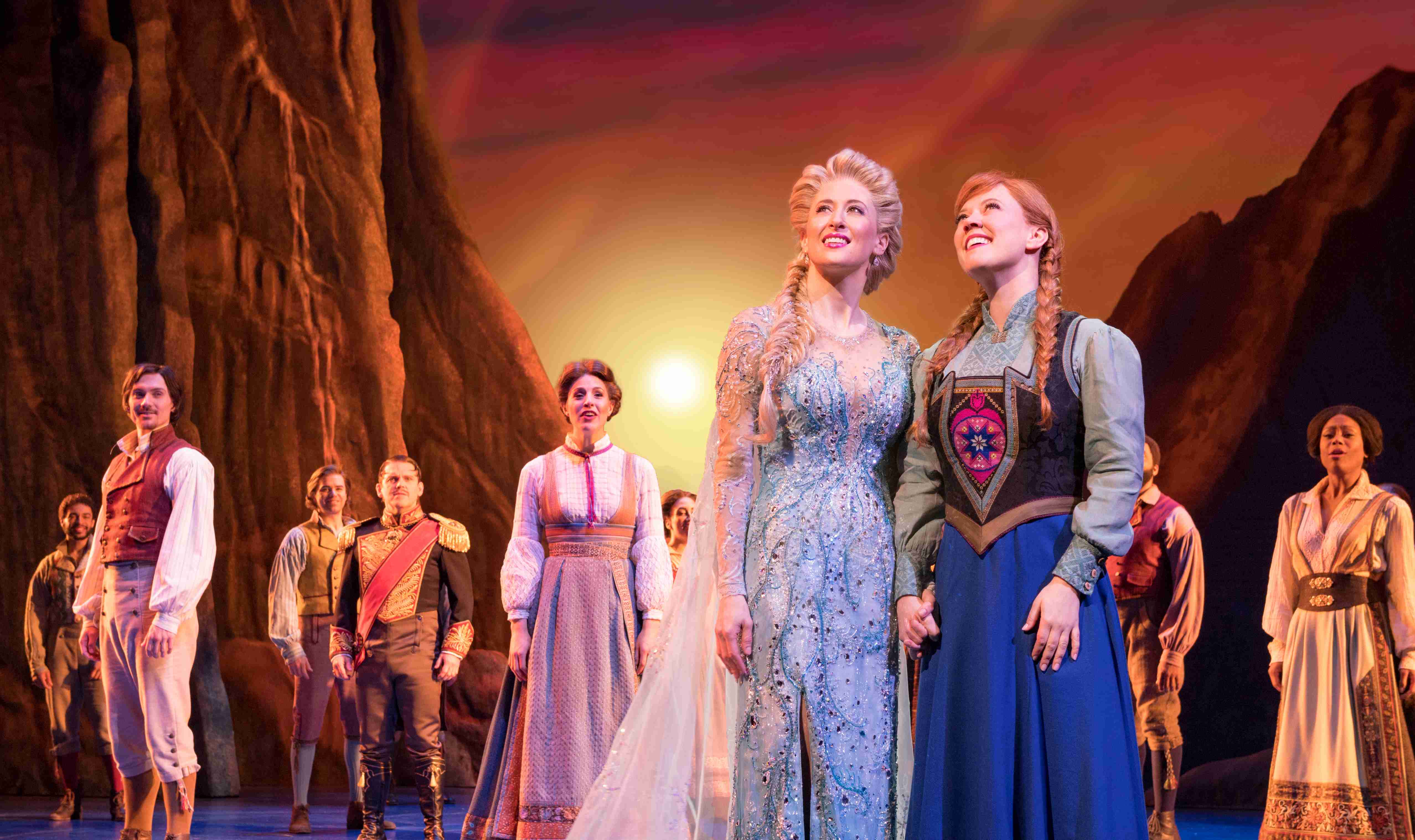 Caissie Levy (Elsa), Patti Murin (Anna) and the Company of FROZEN on Broadway. Photo by Deen van Meer