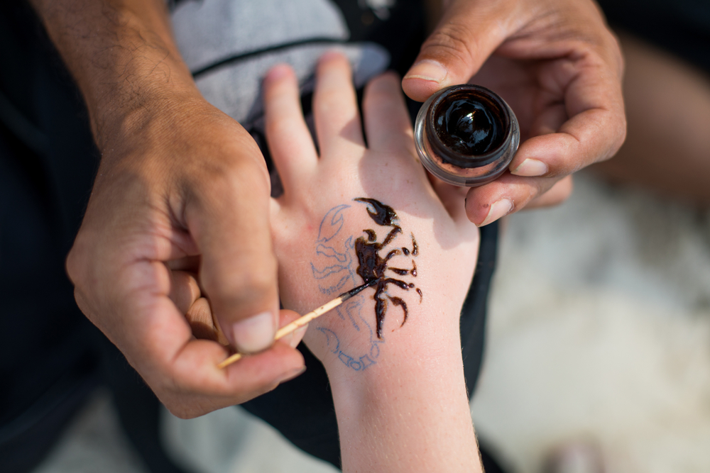 Kids scorpian henna tattoo
