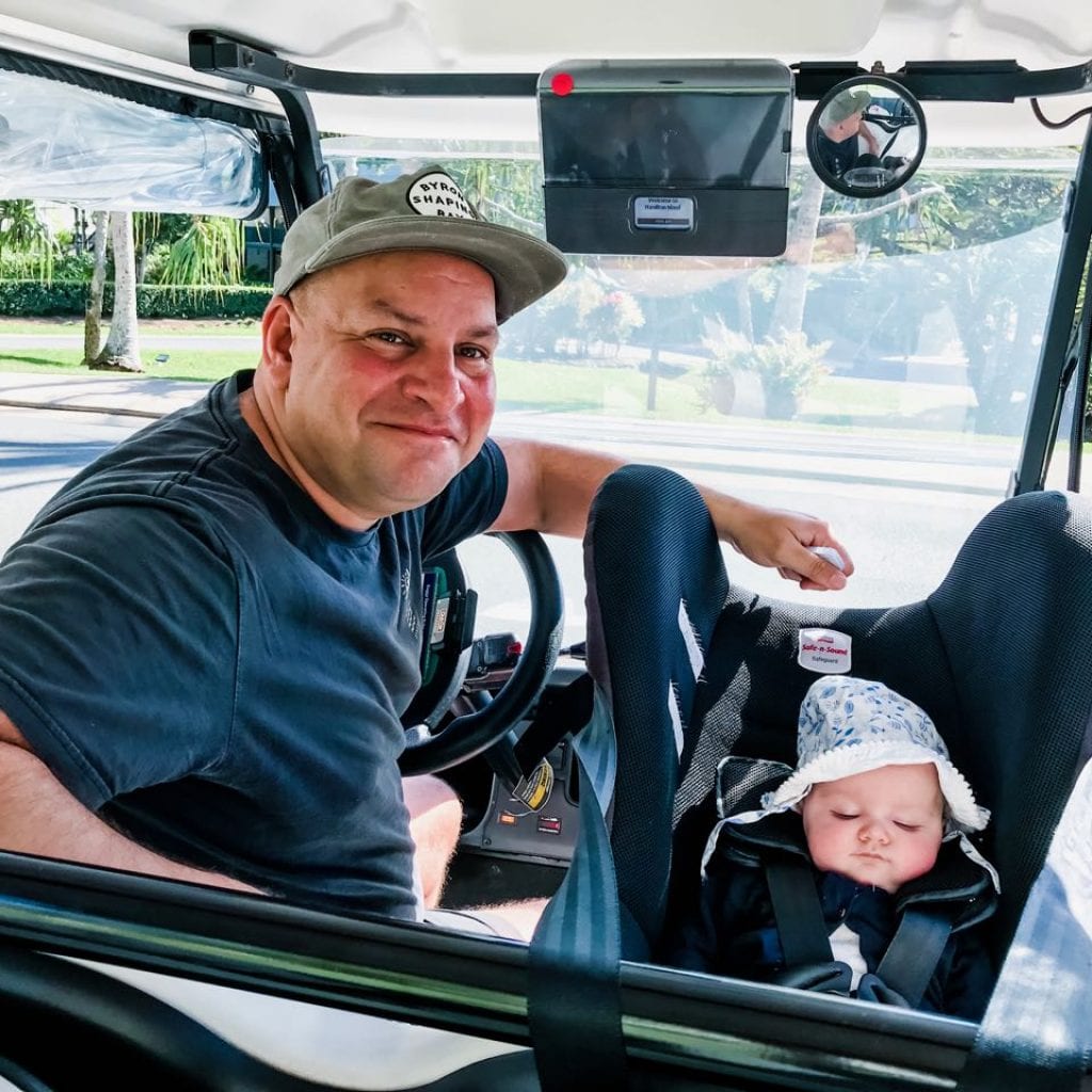 Rear facing car seat in golf buggy on Hamilton Island