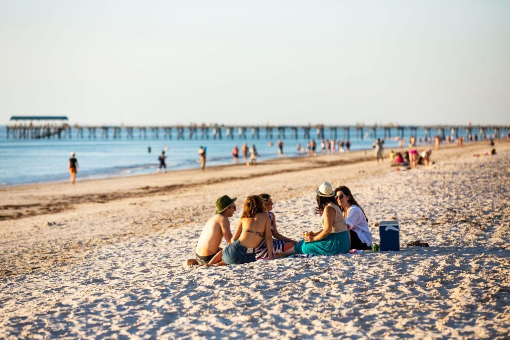 Picnics, swims, sport on the sand? Relax or get physical at Henley Beach. Credit: South Australian Tourism Commission/ Josie Withers