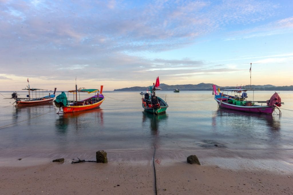 Fishing and long boats blend into the scenery at many Thai beaches Credit: Shutterstock