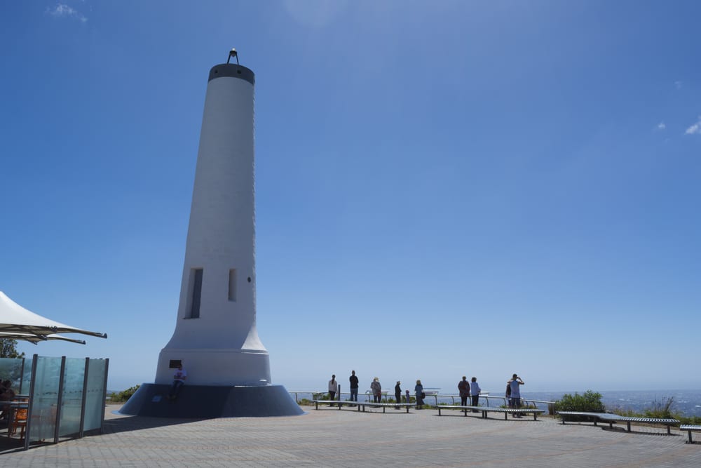 Mount Lofty, South Australia, Australia - 17 Dec 2016: Tourists at The Flinders column, an obelisk that was once a trig station is situated at Mount Lofty Summit.