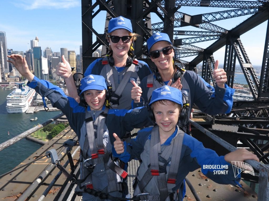 two ladies & two kids doing the express climb (middle arch) of sydney's bridge climb