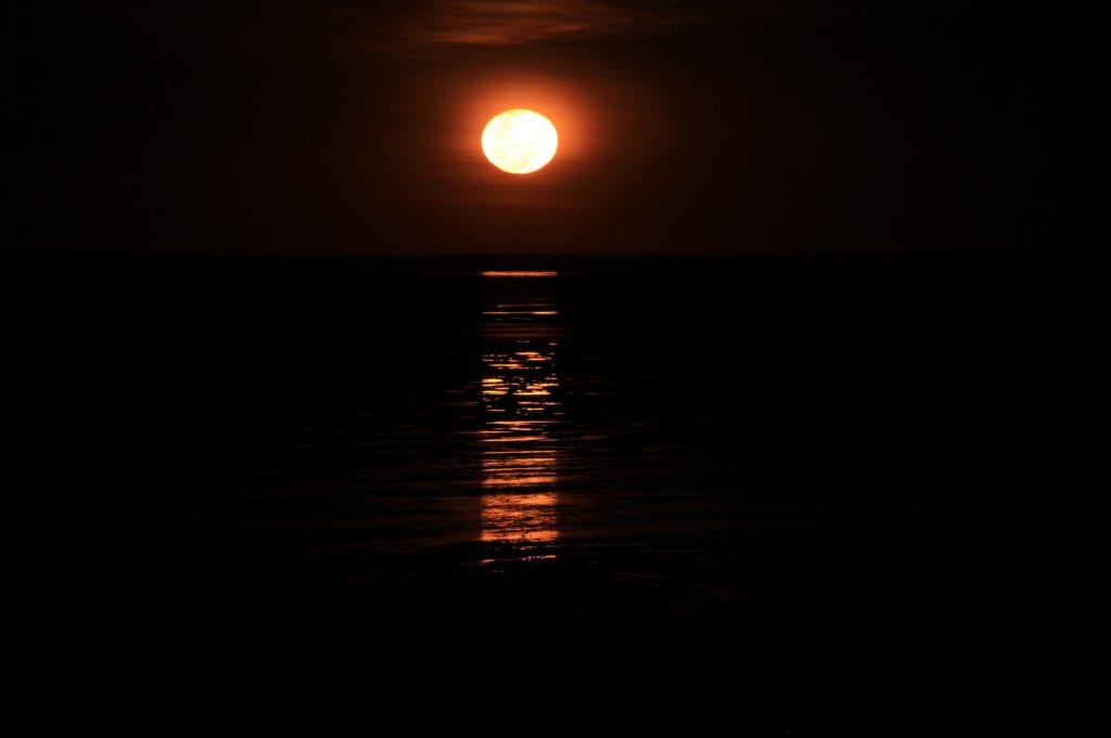 stairway to the moon, full moon light over low tide