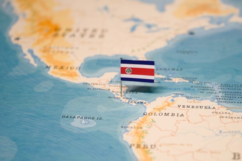Map of Costa Rica with the flag sticking out to mark the exact location